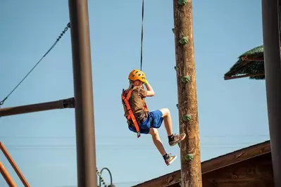 Child on Timber Towers at Lumberjack Feud