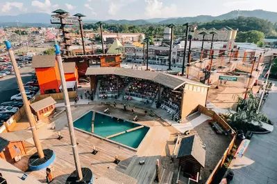 drone perspective of lumberjack show