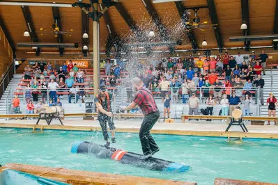 lumberjacks log rolling at paula deen's lumberjack feud